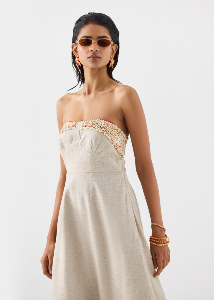A Model Wearing Beige Linen Palm Island Tiered Dress, curated by Only Ethikal