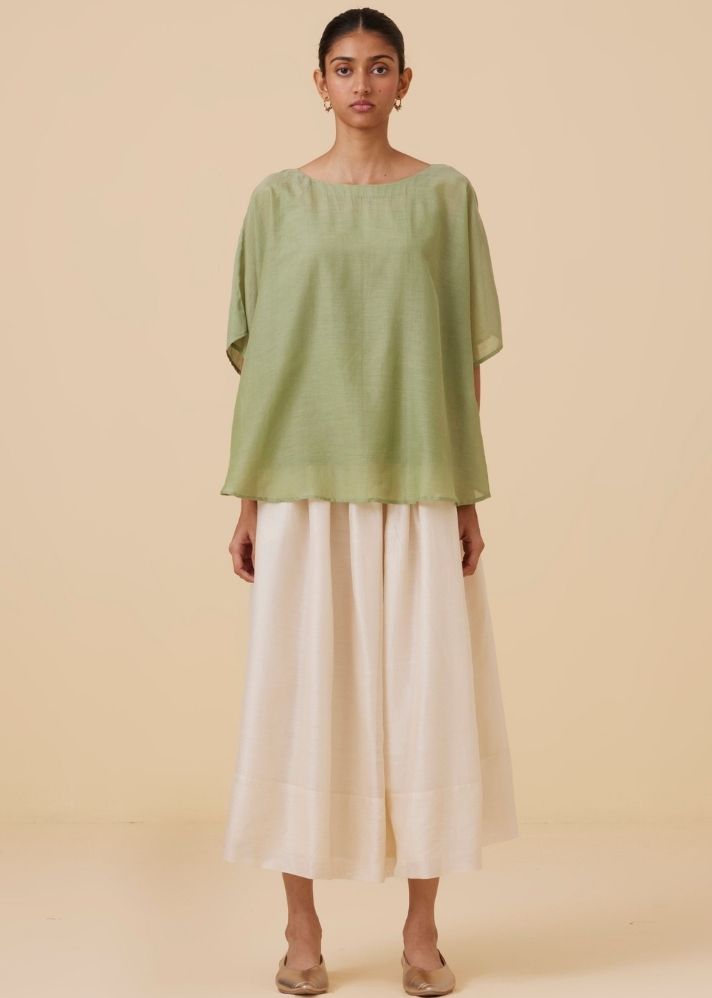 A Model Wearing Green Cotton Silk Kosh Green Cape Top , curated by Only Ethikal