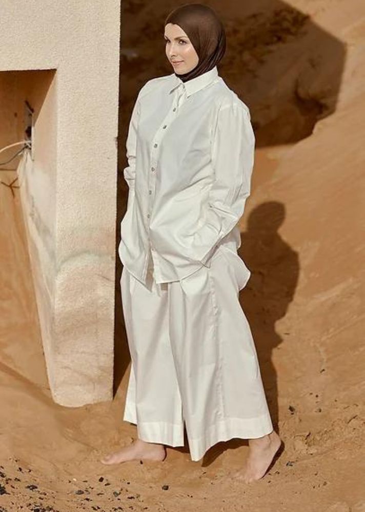 A Model Wearing White Organic Cotton Ali Pants, curated by Only Ethikal