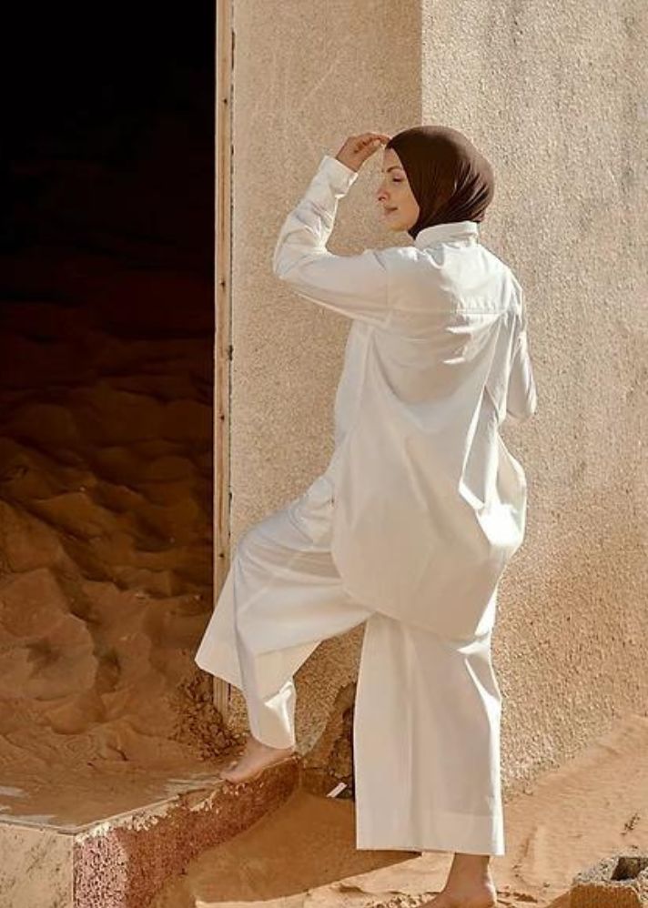 A Model Wearing White Organic Cotton Ali Pants, curated by Only Ethikal