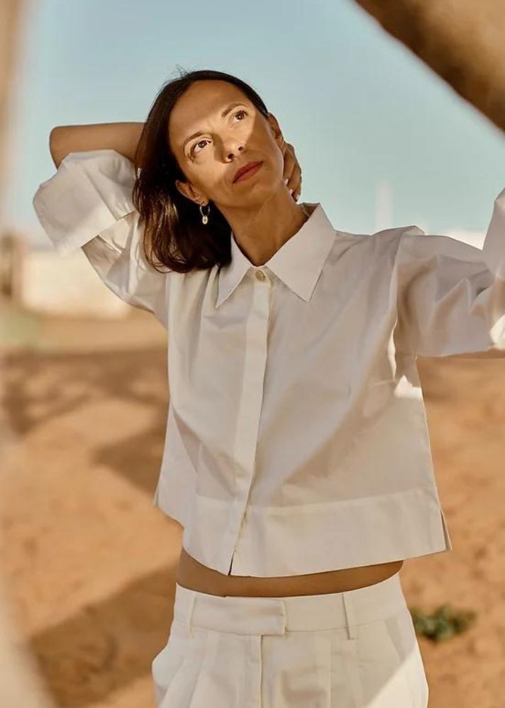 A Model Wearing White Organic Cotton April Crop Blouse, curated by Only Ethikal