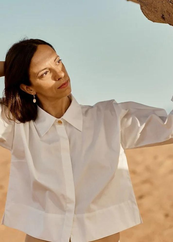 A Model Wearing White Organic Cotton April Crop Blouse, curated by Only Ethikal