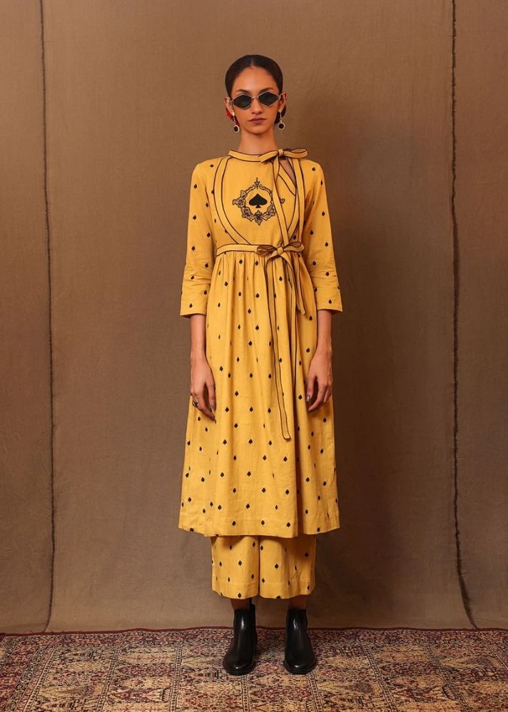 A Model Wearing Yellow Pure Cotton Mustard Club Emb Rakha Tunic Set (2 Pcs), curated by Only Ethikal