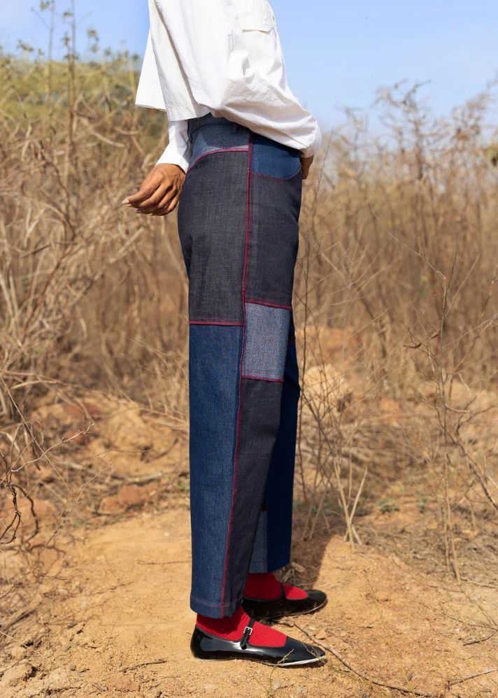 A Model Wearing Multicolor Upcycled Denim Eliza Tapered Pants, curated by Only Ethikal
