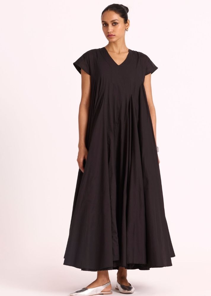 A Model Wearing Black Organic Cotton Hadil Black Cotton Maxi Dress , curated by Only Ethikal