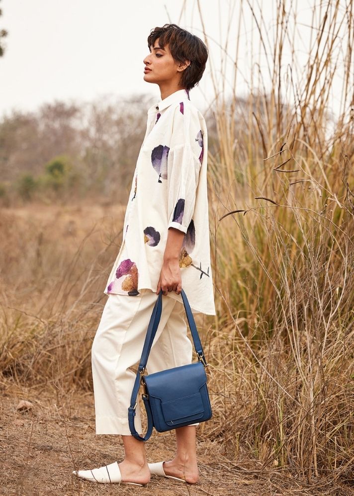 A Model Wearing White Cotton Mul Cascade fling Shirt, curated by Only Ethikal