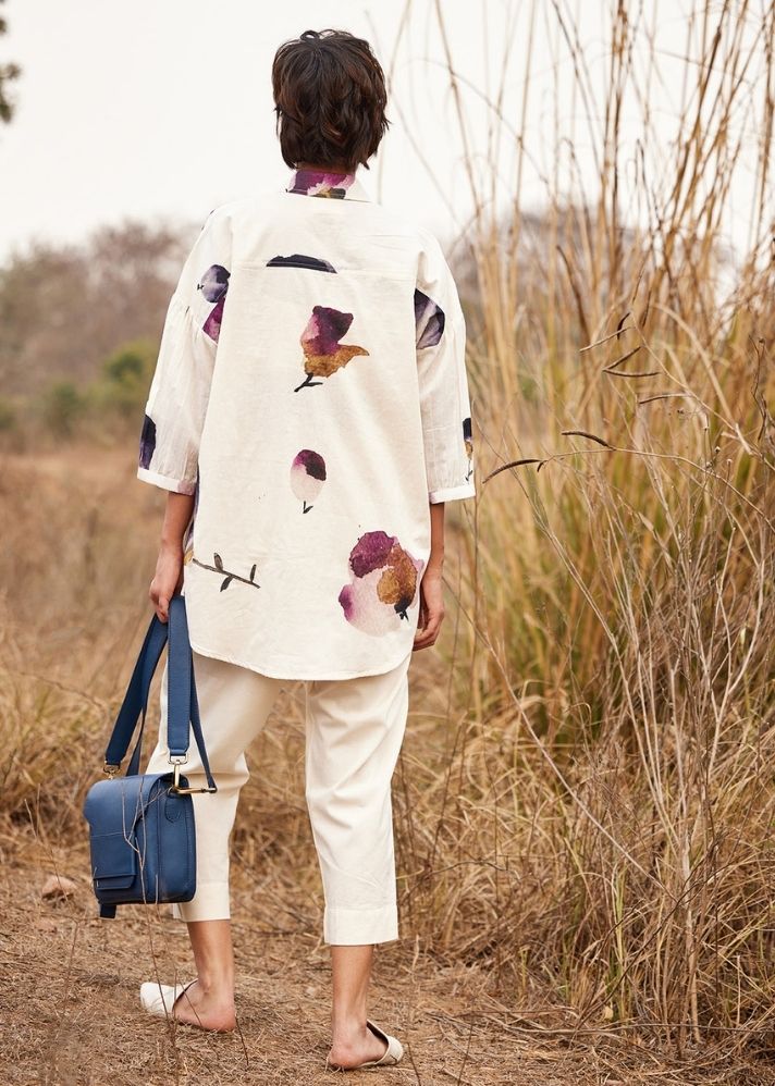 A Model Wearing White Cotton Mul Cascade fling Shirt, curated by Only Ethikal