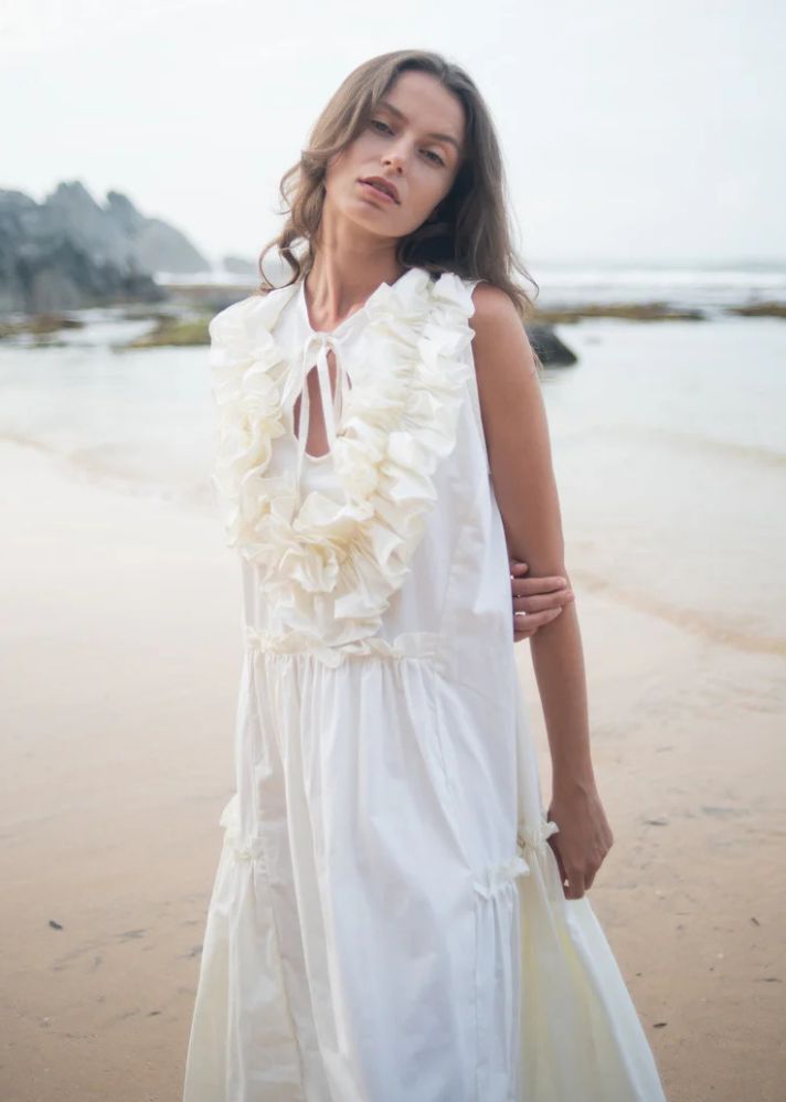 A Model Wearing White Pure Cotton Eliza Cream Dress , curated by Only Ethikal