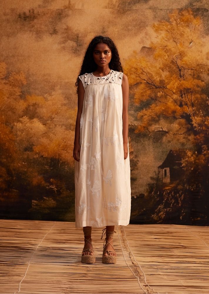 A Model Wearing White Cotton Silk Chanderi Kujaku Knife Pleat Maxi Dress, curated by Only Ethikal