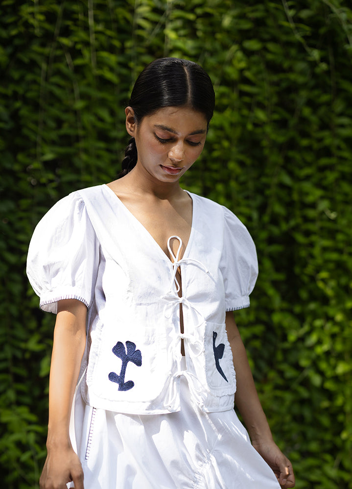 A Model Wearing White Upcycled Fabric Fern White Top, curated by Only Ethikal