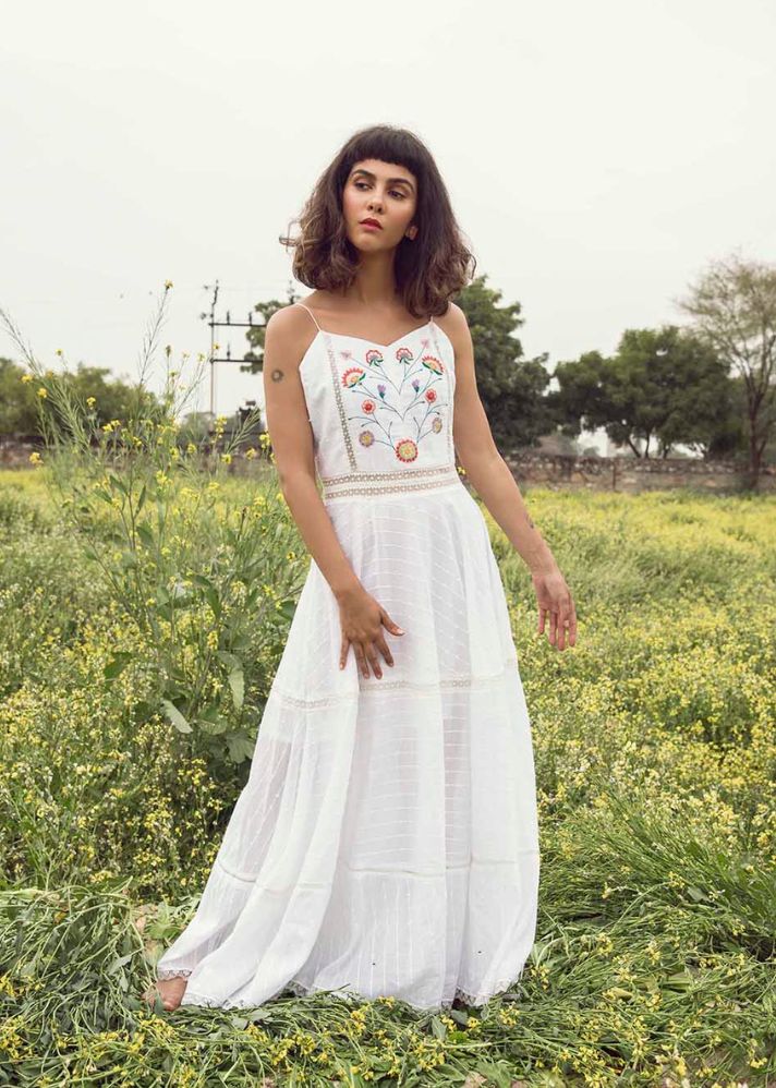 A Model Wearing White Handloom Cotton Soothing Wind Of Spring Dress In Cotton, curated by Only Ethikal