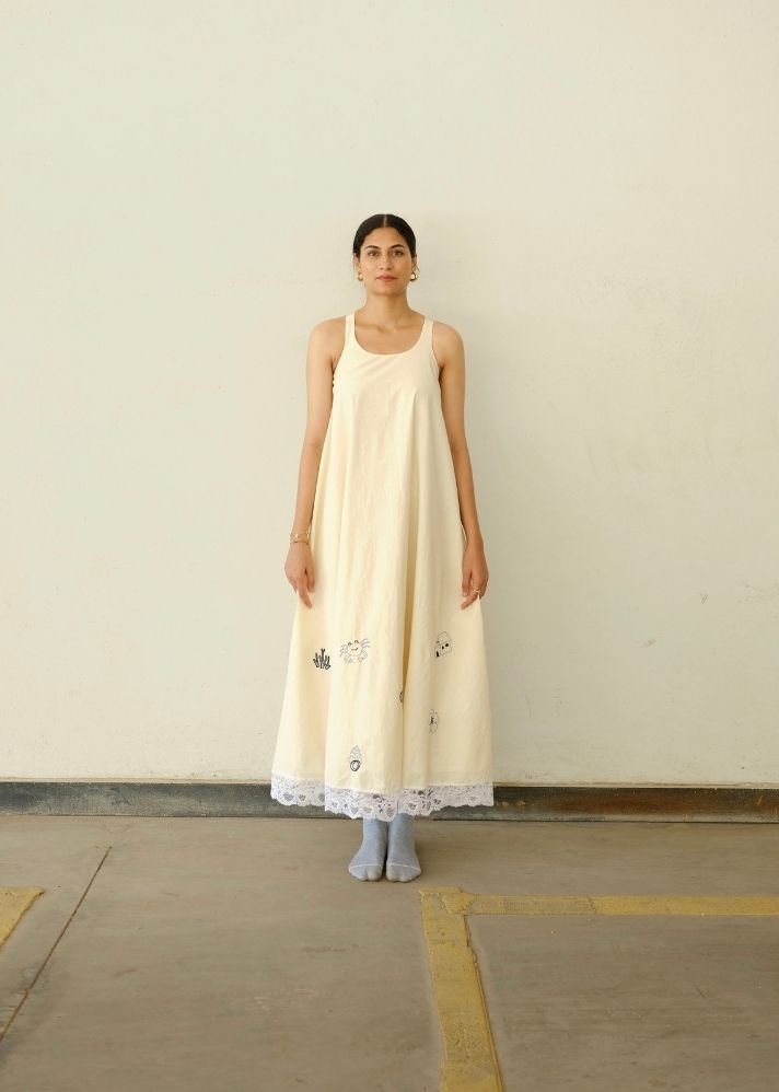 A Model Wearing White Organic Cotton By The Bay Dress, curated by Only Ethikal