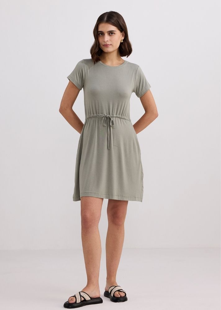 A Model Wearing Grey Modal Drawstring Short T-Shirt Dress In Light Olive
, curated by Only Ethikal