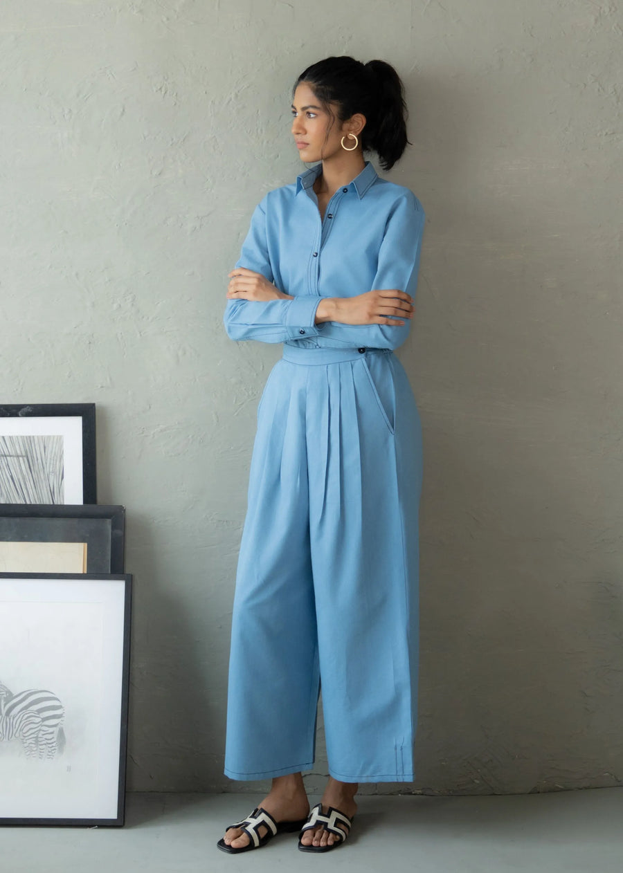 A Model Wearing Blue Denim Everyday Voyager Pant, curated by Only Ethikal