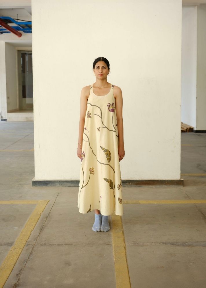 A Model Wearing Off White Organic Cotton A Dandelions Wish , curated by Only Ethikal