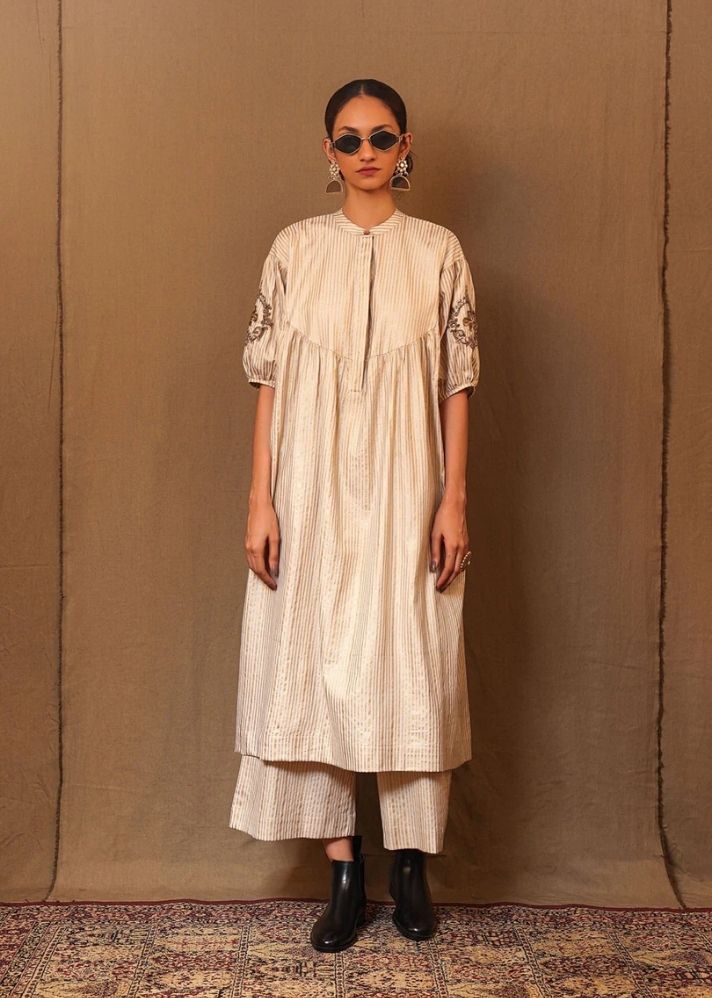 A Model Wearing White Pure Cotton Off-White Str Emb Club Acra Tunic, curated by Only Ethikal