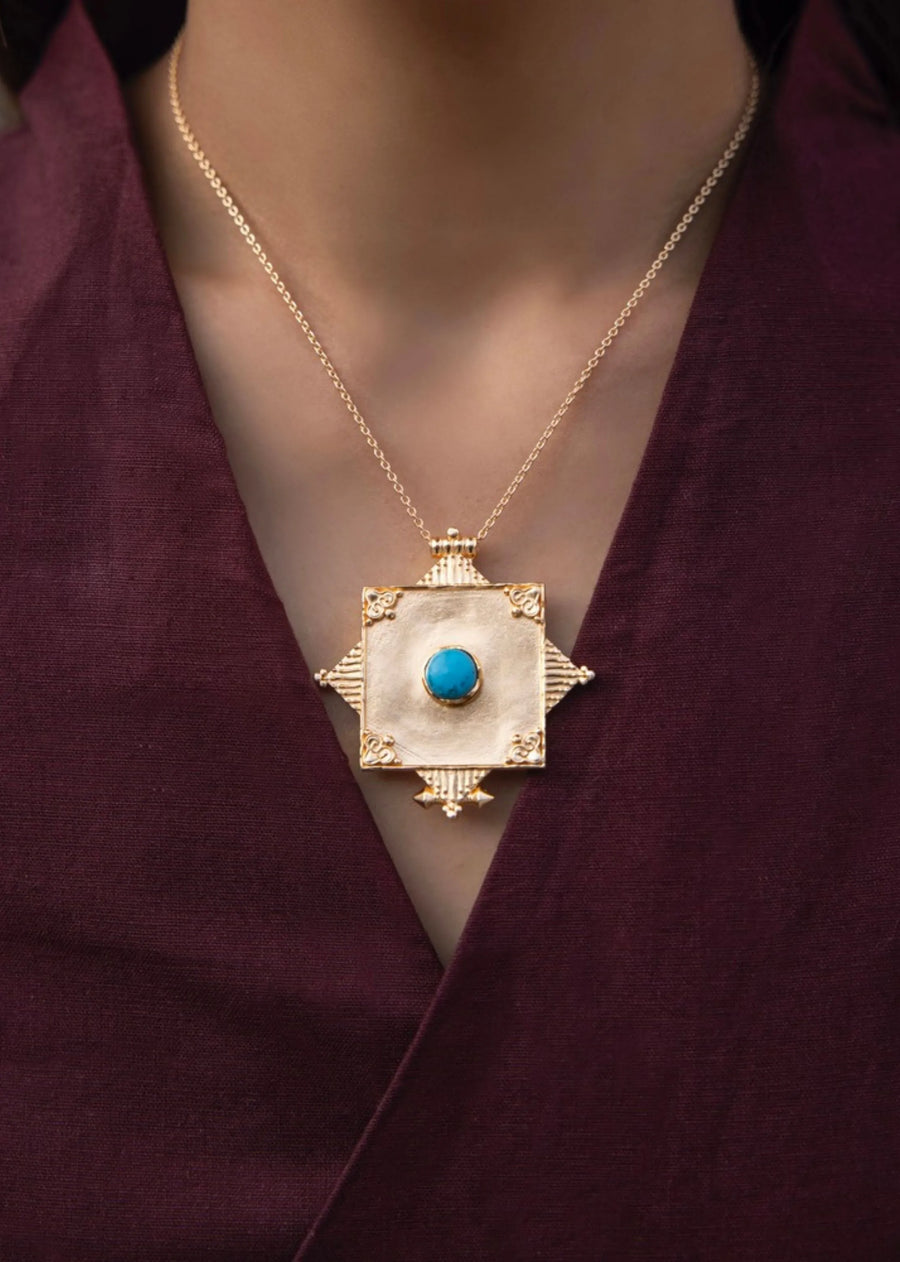 A Model Wearing Gold 18k Gold plated over brass Turquiose Gaul Necklace, curated by Only Ethikal