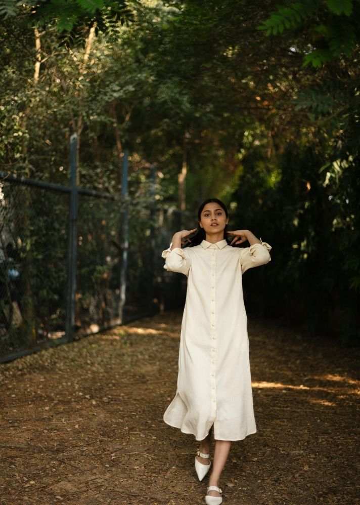 A Model Wearing White   Wool White  Zinniadress  , curated by Only Ethikal