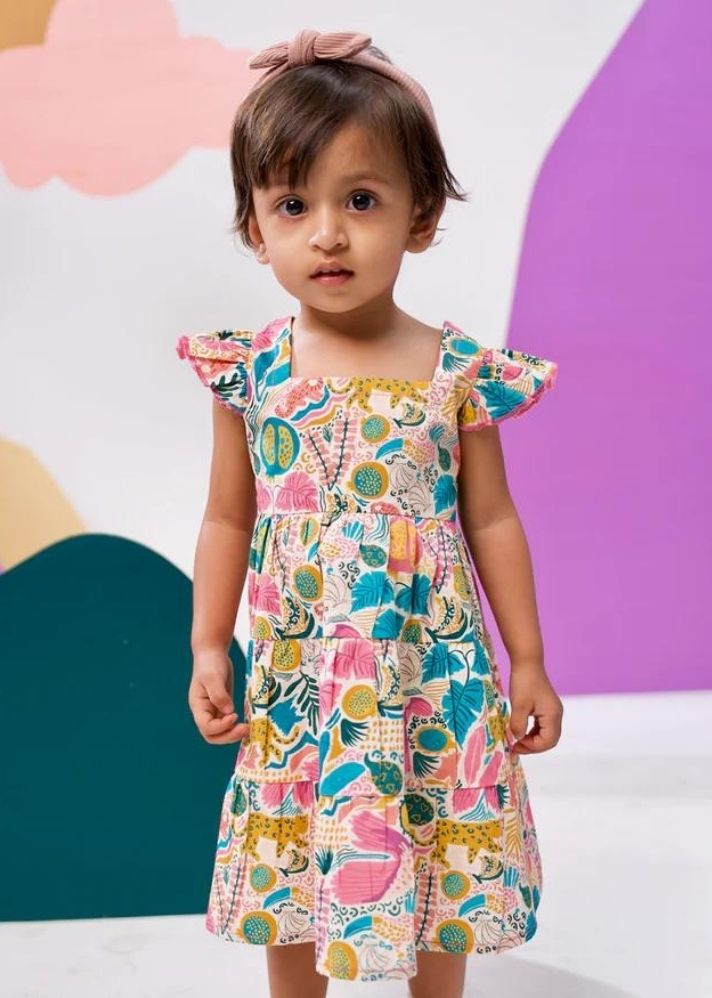 A Model Wearing Multicolor Cotton Jungle Bungle Printed Cotton Tiered Dress, curated by Only Ethikal