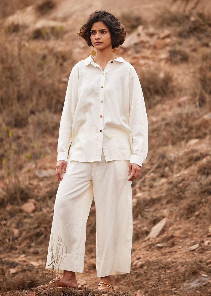 A Model Wearing White  Cotton Mul Heer co ord set, curated by Only Ethikal