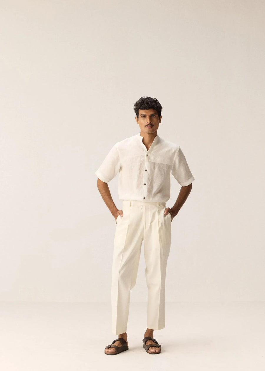 A Model Wearing White Cotton Twill Frost Walk Trousers, curated by Only Ethikal