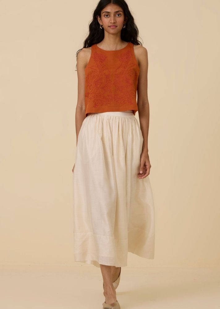 A Model Wearing Orange Linen Olena Orange Embroidered Top , curated by Only Ethikal