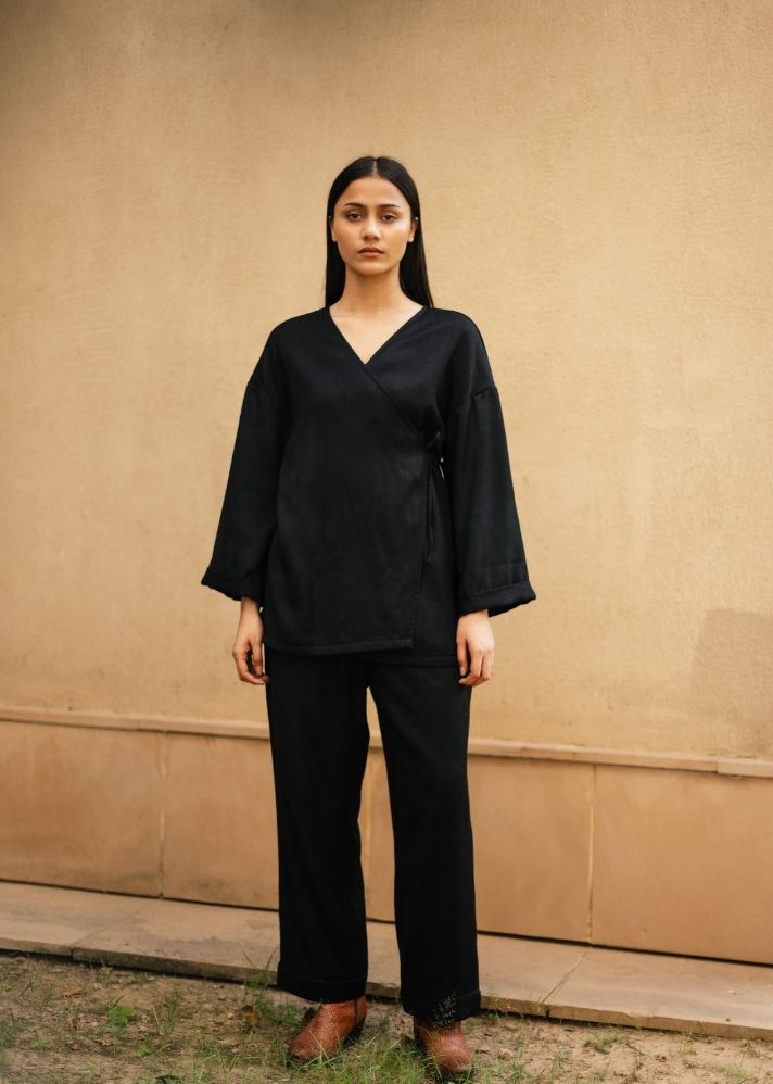 A Model Wearing Black  Wool Pansy Top- Black , curated by Only Ethikal