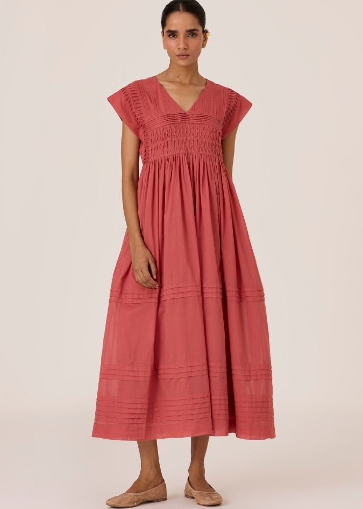 A Model Wearing Pink Organic Cotton Aelia Rouge Pleated Midi Dress , curated by Only Ethikal