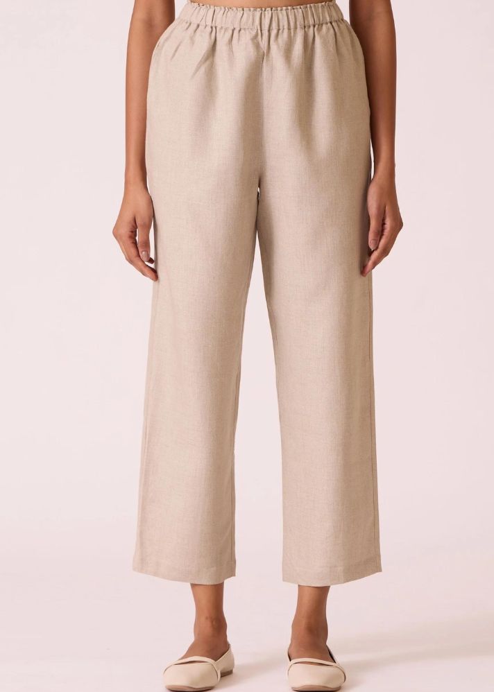 A Model Wearing Beige Linen Cotton Torri Beige Linen Trousers , curated by Only Ethikal