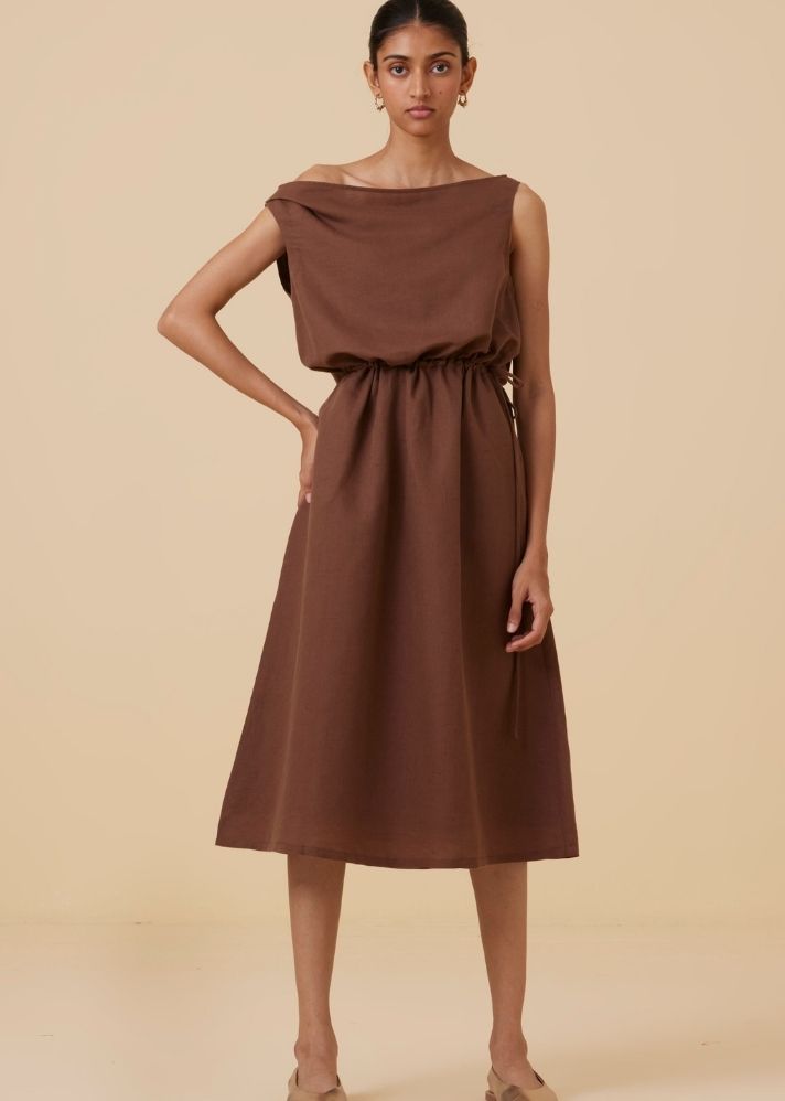 A Model Wearing Brown Linen Salma Brown Midi Dress , curated by Only Ethikal