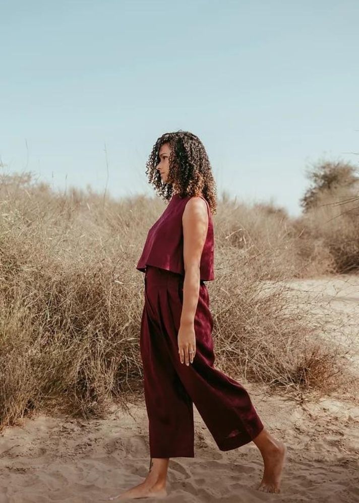 A Model Wearing Red Linen Amelia High Waisted Pants, curated by Only Ethikal