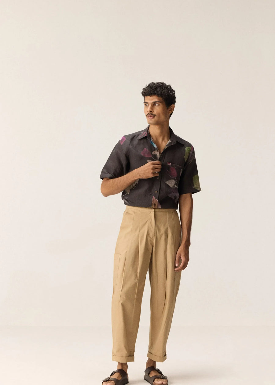 A Model Wearing Beige Cotton Dust Route Trousers, curated by Only Ethikal