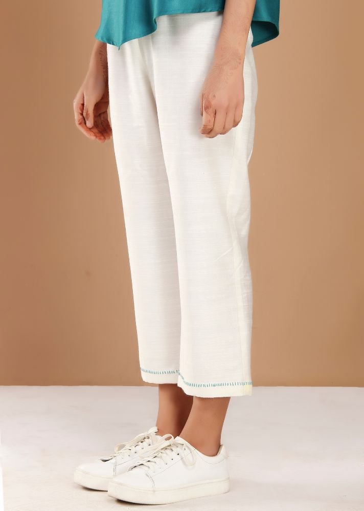 A Model Wearing White Handloom Cotton White Slub Tussar Cotton Pants, curated by Only Ethikal