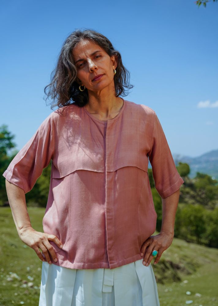 A Model Wearing Pink Vegan Silk L.03 Unisex Organic Lotus Boxy Shirt, curated by Only Ethikal