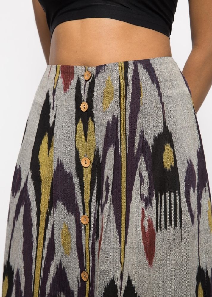 A Model Wearing Multicolor Handwoven Cotton Ikat Pleated Midi Skirt, curated by Only Ethikal