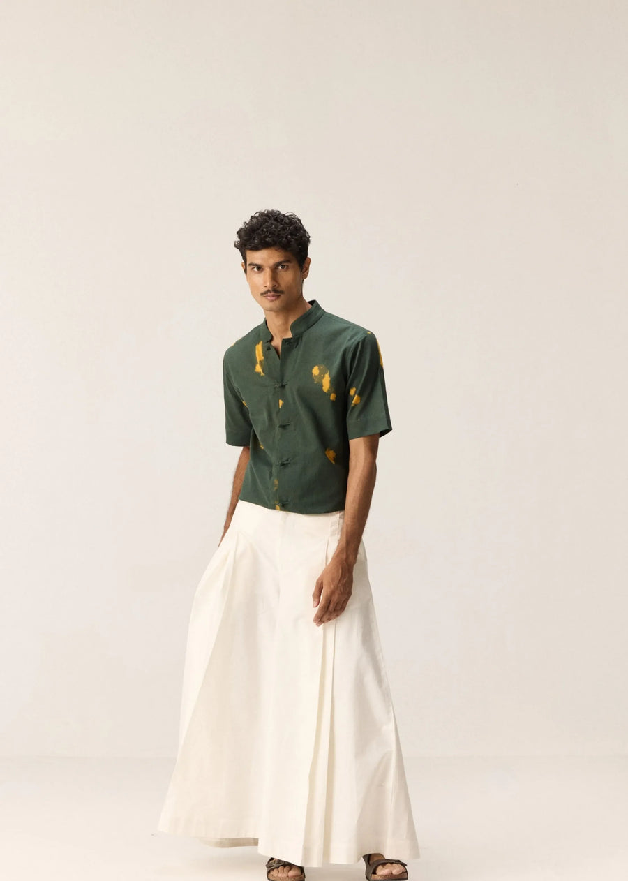 A Model Wearing White Cotton Snow Drift Trousers, curated by Only Ethikal