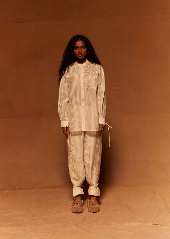 A Model Wearing White Cotton Silk Chanderi Dobutsu Mandarin Shirt, curated by Only Ethikal