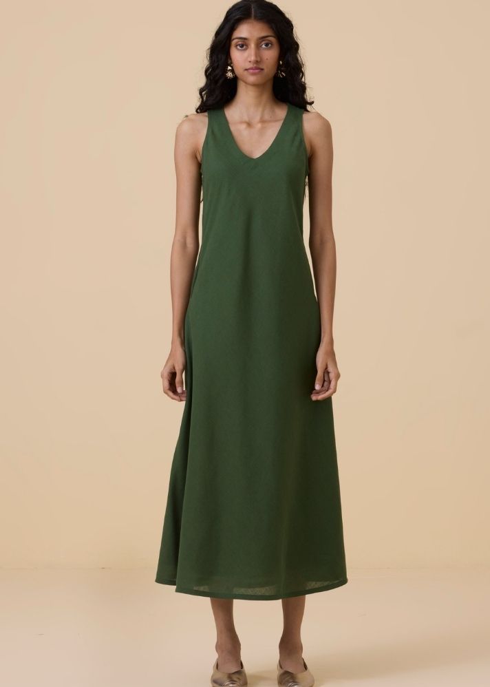 A Model Wearing Green Linen Saira Green Sleeveless Maxi Dress , curated by Only Ethikal