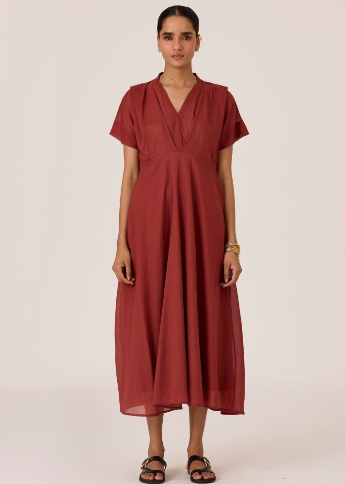 A Model Wearing Brown Organic Cotton Raed Umber Pleated Midi Dress , curated by Only Ethikal