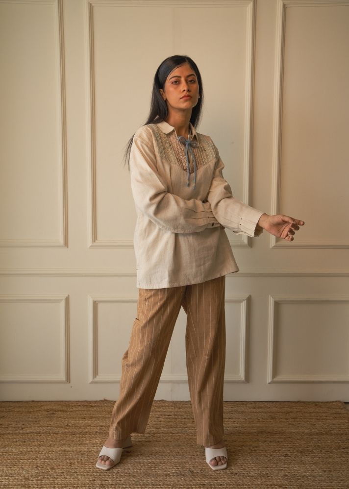 A Model Wearing White Pure Cotton Materiality Yoke Detail Shirt, curated by Only Ethikal