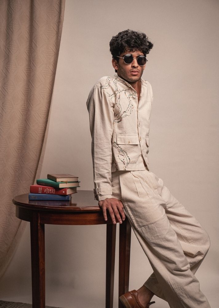 A Model Wearing White Pure Cotton Rewind Unisex Bomber Jacket, curated by Only Ethikal