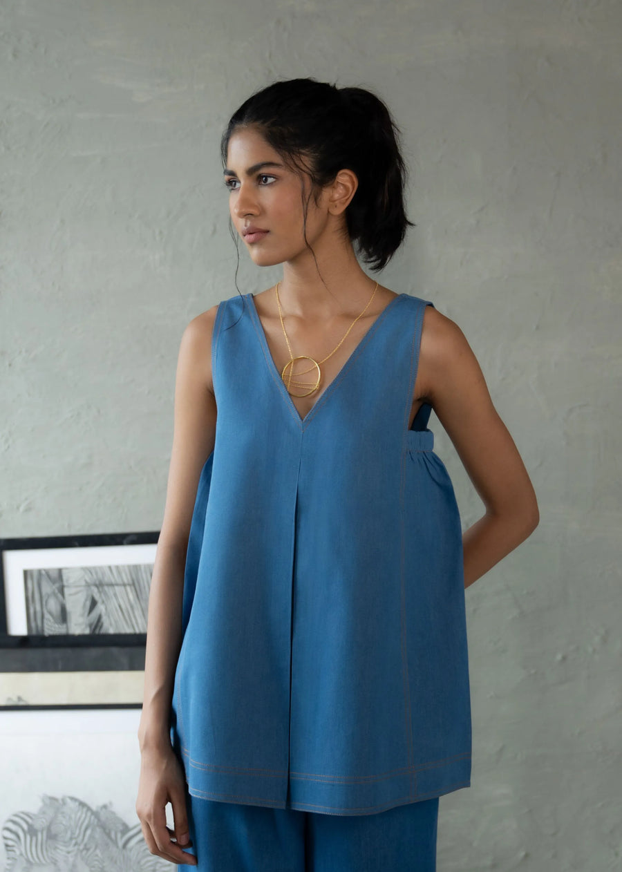A Model Wearing Blue Denim Explorer’S Note Top, curated by Only Ethikal