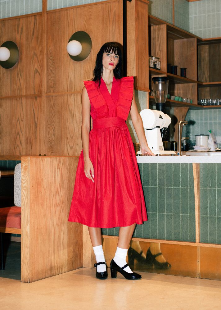 A Model Wearing Red Pure Cotton Agnes Red Pleated Dress, curated by Only Ethikal