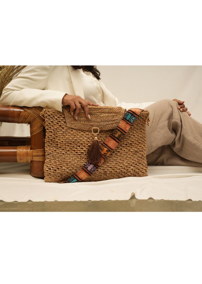 A Model Wearing Multicolor Banana Woodland Weave: Woven Banana Bark Laptop Messenger Bag- Brown, curated by Only Ethikal