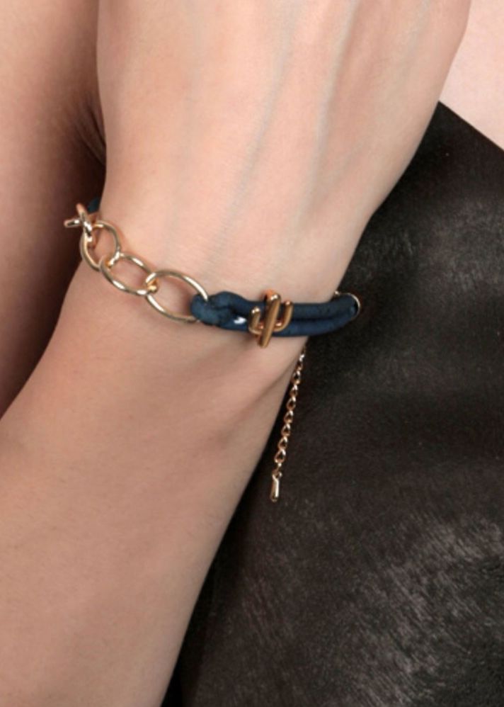 A Model Wearing Blue Cork Arizona Bold Gold Bracelet In Navy Blue, curated by Only Ethikal