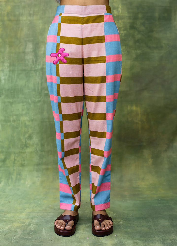 A Model Wearing Multicolor Upcycled Fabric Waris Striped Pants, curated by Only Ethikal