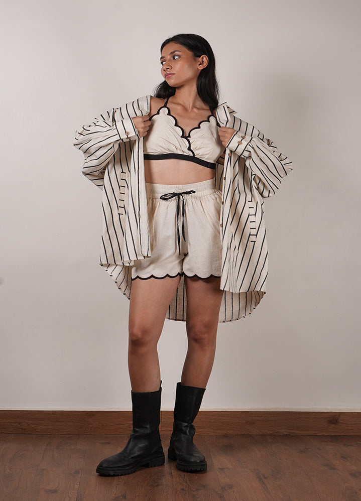 A Model Wearing Off White Organic Cotton Mati Oversized Striped Shirt Set-Oatmeal , curated by Only Ethikal