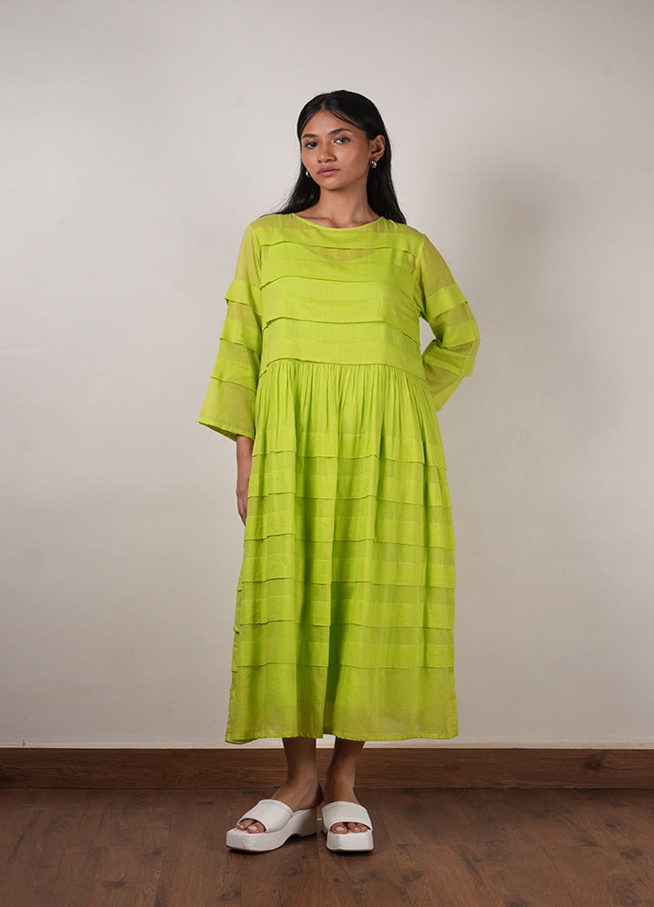 A Model Wearing Green Organic Cotton Mati Pleated Dress, curated by Only Ethikal