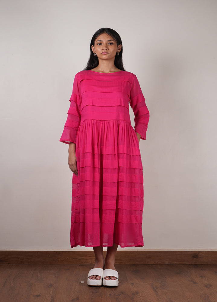 A Model Wearing Pink Organic Cotton Mati Pleated Dress, curated by Only Ethikal