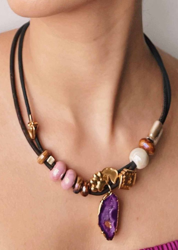 A Model Wearing Multicolor Cork Forest Ceramic Necklace With 18K Gold Unicorn And Paw Accents, curated by Only Ethikal